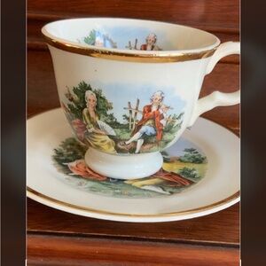 Vintage Porcelain Teacup and Saucer with Gold Trim